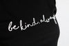 Black and white be kind always tee close up. 