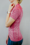 Pink running top side shot by Mama Life London